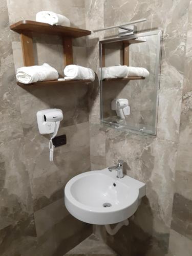 Un baño de HOTEL VILA TWIX