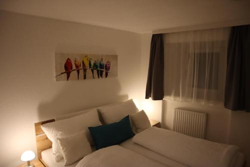 Postel nebo postele na pokoji v ubytování Ferienwohnung Lenz