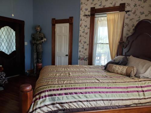 Ein Bett oder Betten in einem Zimmer der Unterkunft 1890 Karcher Haus