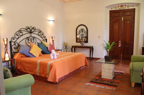 Katil atau katil-katil dalam bilik di Hotel Boutique Parador San Miguel Oaxaca