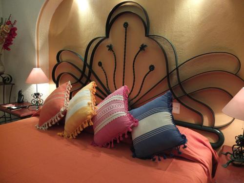 Katil atau katil-katil dalam bilik di Hotel Boutique Parador San Miguel Oaxaca