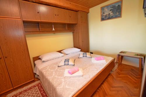En eller flere senger på et rom på Apartment Slavica