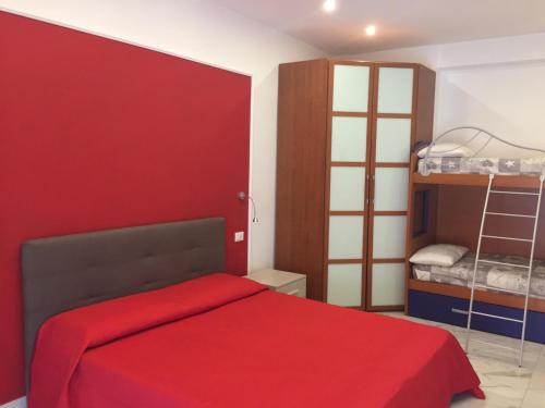 En eller flere senge i et værelse på Miniappartamenti da Lello