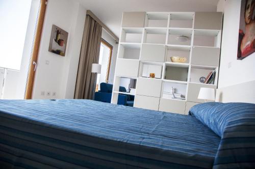 Voodi või voodid majutusasutuse La Corte di Leuca Residence toas