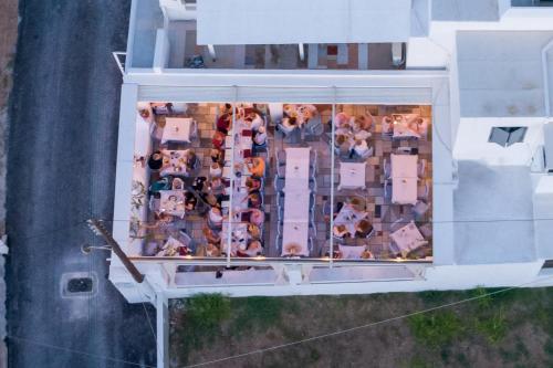 an aerial view of a building with a group of people at Pavlos Place in Antiparos Town