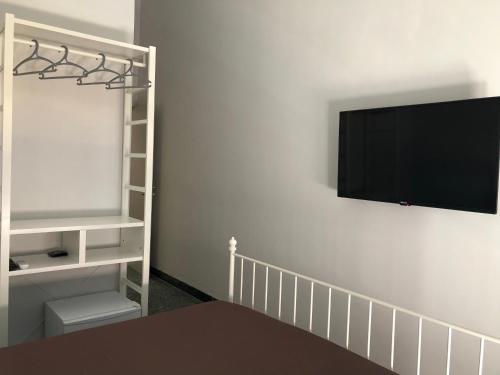 TV a/nebo společenská místnost v ubytování B&B Meliora Rooms