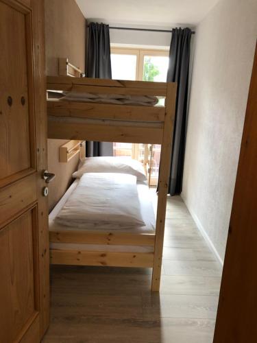 Haus Bergsicht Loferにあるベッド