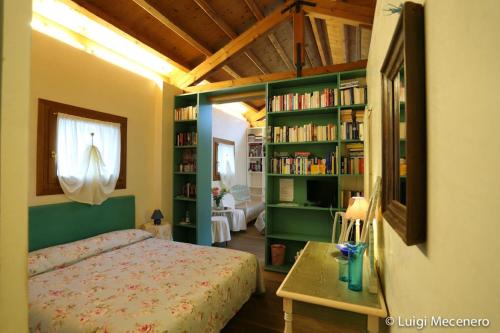 Postel nebo postele na pokoji v ubytování B&B San Nicolò