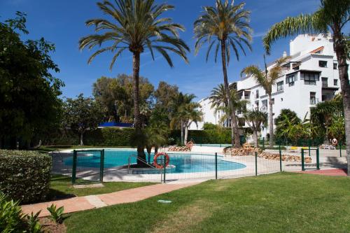 Swimmingpoolen hos eller tæt på Jardines del Puerto Apartment for up to 6, totally refurbished 2025, gardens, pools, garage, wifi