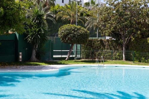 Swimmingpoolen hos eller tæt på Jardines del Puerto Apartment for up to 6, totally refurbished 2025, gardens, pools, garage, wifi