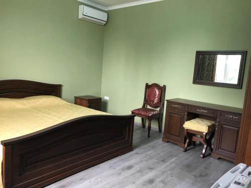 Кровать или кровати в номере Gudauta