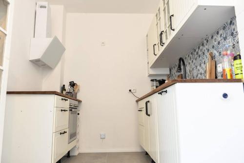 Kuchyň nebo kuchyňský kout v ubytování 3FLOORS