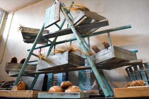 a wooden shelf filled with different types of food at Aldiana Club Fuerteventura in Morro del Jable