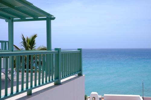 a balcony with a view of the ocean at Aldiana Club Fuerteventura in Morro del Jable