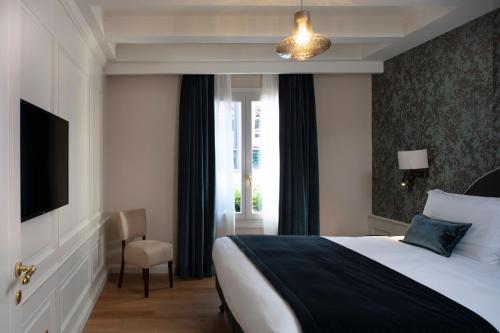 Un pat sau paturi într-o cameră la Residenza Ducato