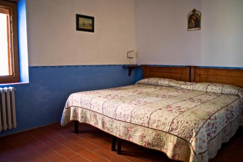 Postel nebo postele na pokoji v ubytování Lionforti Da Vico