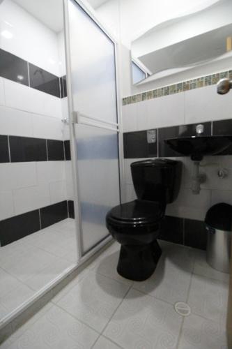 Bilik mandi di HOTEL MANAGER OBELISK