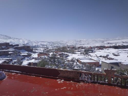 a view of a city with snow on the ground at Auberge Restaurant Telouet in Telouet