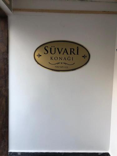 a sign on the wall of a building at Süvari Hotel in Aksaray