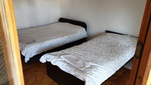 Postel nebo postele na pokoji v ubytování Majestic Rooms&Apartments