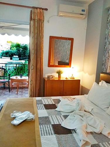 Ένα ή περισσότερα κρεβάτια σε δωμάτιο στο Stella's Home