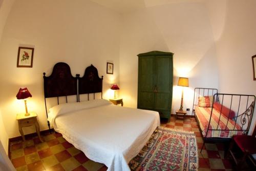 Säng eller sängar i ett rum på Agriturismo Le magnolie