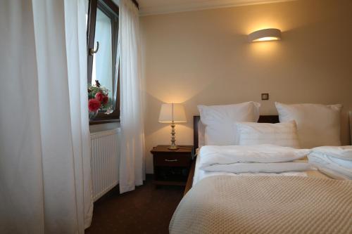 Voodi või voodid majutusasutuse Villa Czarli toas