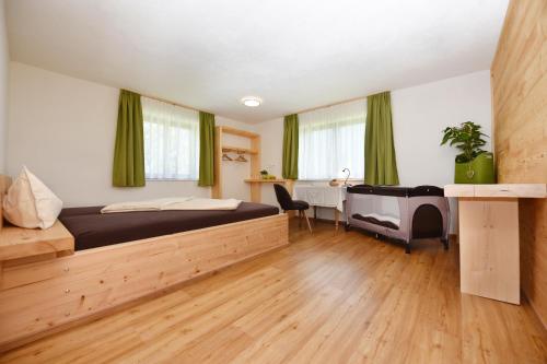 Postel nebo postele na pokoji v ubytování Mottnerhof