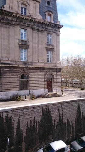 a building with a car parked in front of it at St Charles / La Friche in Marseille