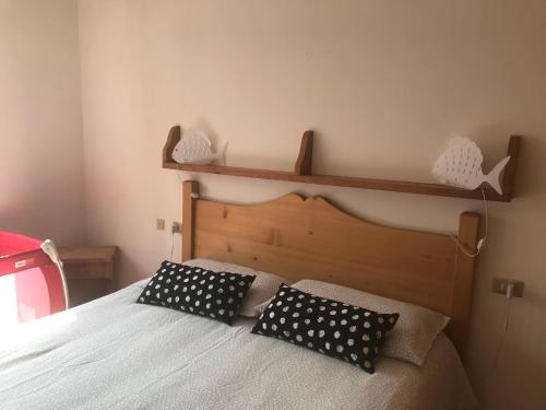 Ένα ή περισσότερα κρεβάτια σε δωμάτιο στο Casa Spizzar