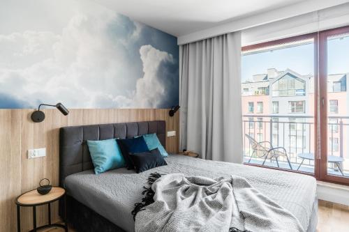 Llit o llits en una habitació de Downtown Apartments Waterlane Island -Riverview Pool, SPA, Gym & Parking
