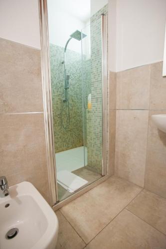 a bathroom with a shower and a sink at Gate To Verona in Verona