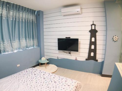 Ένα ή περισσότερα κρεβάτια σε δωμάτιο στο Greenonly Homestay