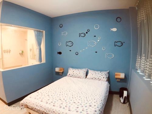 Ένα ή περισσότερα κρεβάτια σε δωμάτιο στο Greenonly Homestay