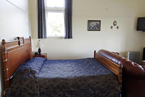 Postel nebo postele na pokoji v ubytování Manor Views NZ