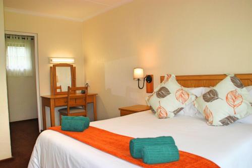 Vuode tai vuoteita majoituspaikassa Gooderson Leisure Riverbend Chalets Self Catering and Timeshare Gold Crown Resort