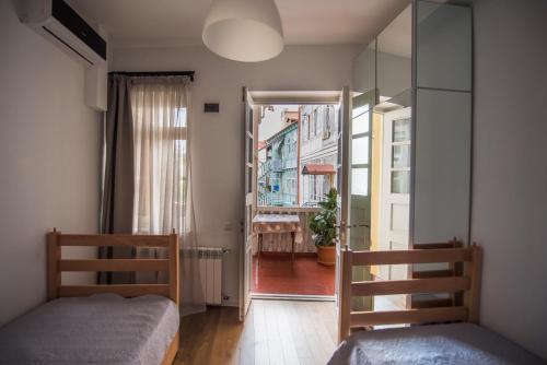 Postel nebo postele na pokoji v ubytování Meidan Suites