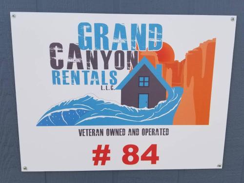a sign for a grand canyon remixes with a house at 084A Grand Canyon Suite with Kitchenette for 4 in Valle