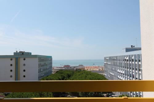 a view of a city with buildings and the ocean at FLATS SOLARIUM in Bibione