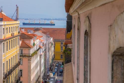 a view of a city street from a building at Casual Belle Epoque Lisboa in Lisbon