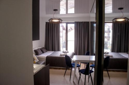 Katil atau katil-katil dalam bilik di New Gudauri Loft 1 Apartment