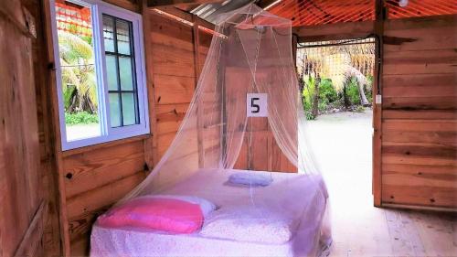 Cama o camas de una habitación en Enjoy San Blas - Isla Diablo (Guna Yala)