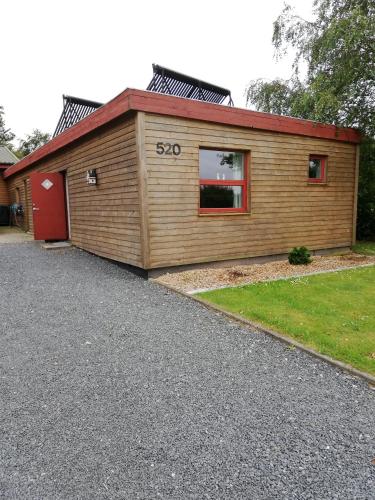 a house with the numbersoo written on the side of it at Annexet in Hjørring