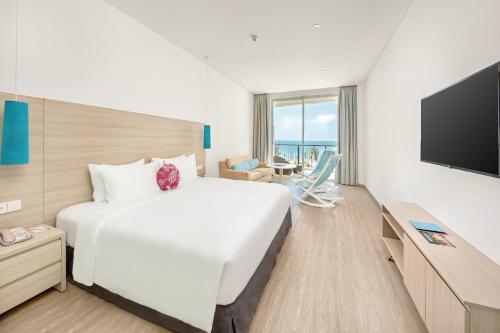 SOL by Meliá Phu Quocにあるテレビまたはエンターテインメントセンター