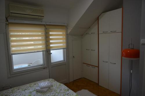 Кровать или кровати в номере VIV apartment 2