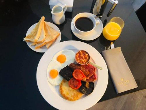 a plate of breakfast food with eggs and toast at Wildes Inns in Chesterfield