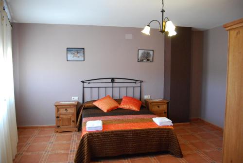 Postel nebo postele na pokoji v ubytování Casas Rurales Mirador Al Castillo
