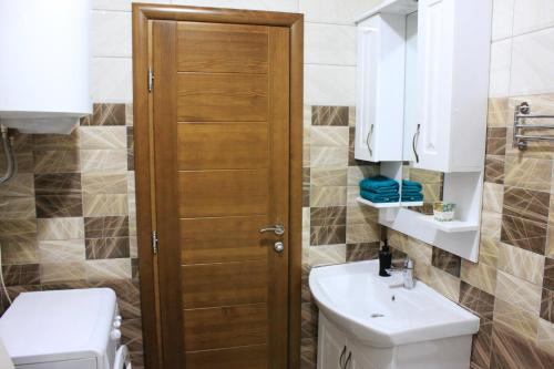 Vonios kambarys apgyvendinimo įstaigoje Mimoza Apartments