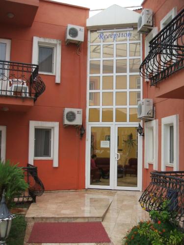 a facade of a building with a door at Samdan Hotel in Pamukkale