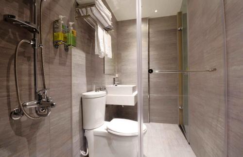 a bathroom with a toilet and a sink and a shower at ARK Hotel - Dongmen in Taipei